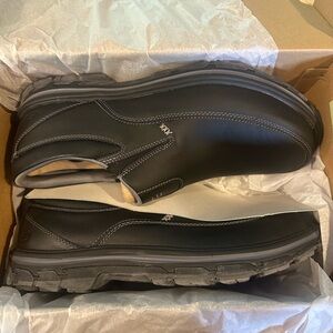 Skechers Black slip ons size 13